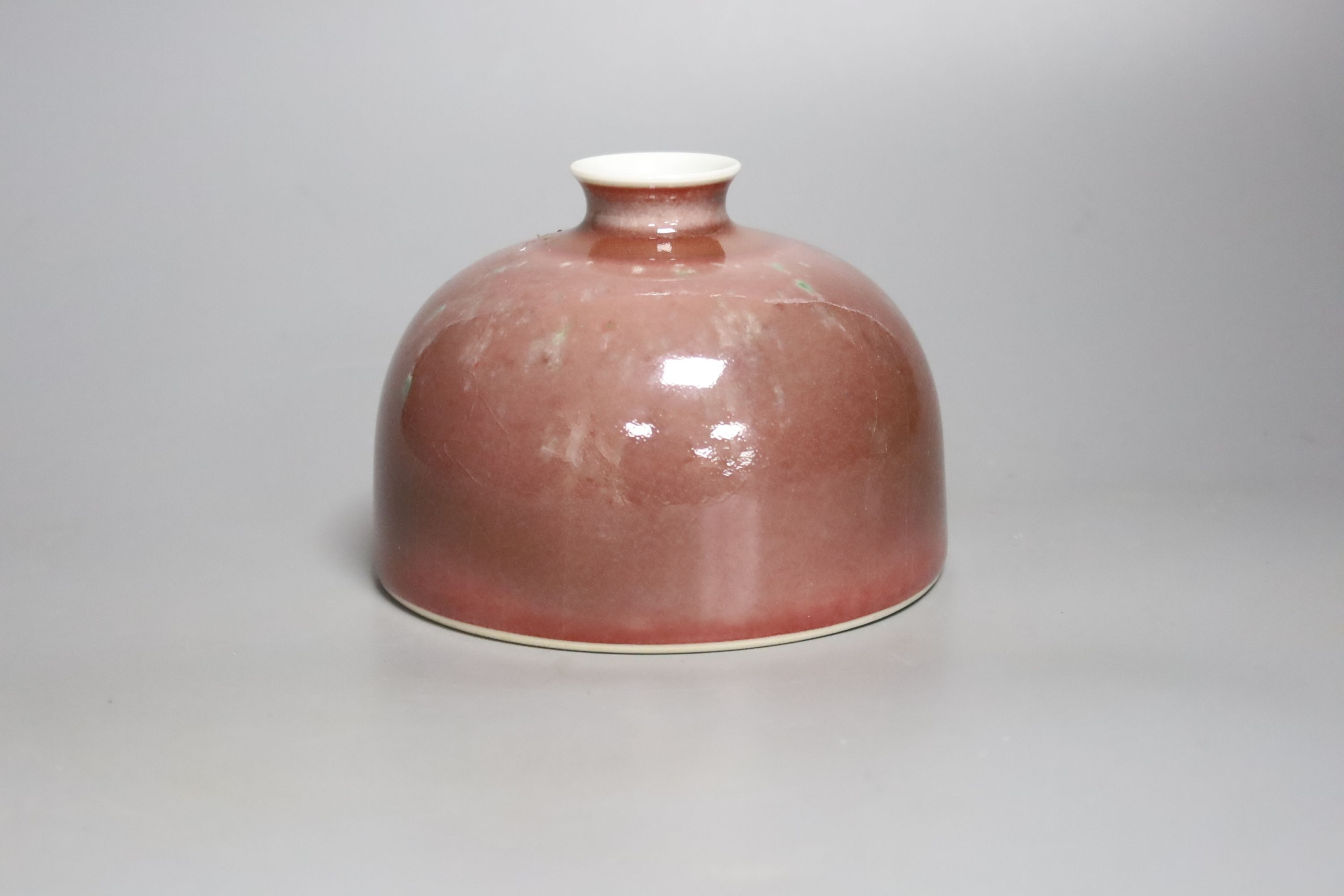 A Chinese ox-blood water pot, height 9cm